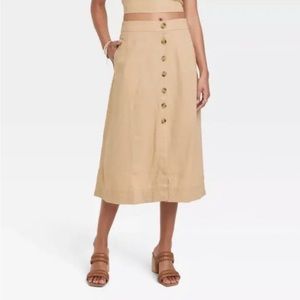 Women’s utility midi A-line universal thread NWT